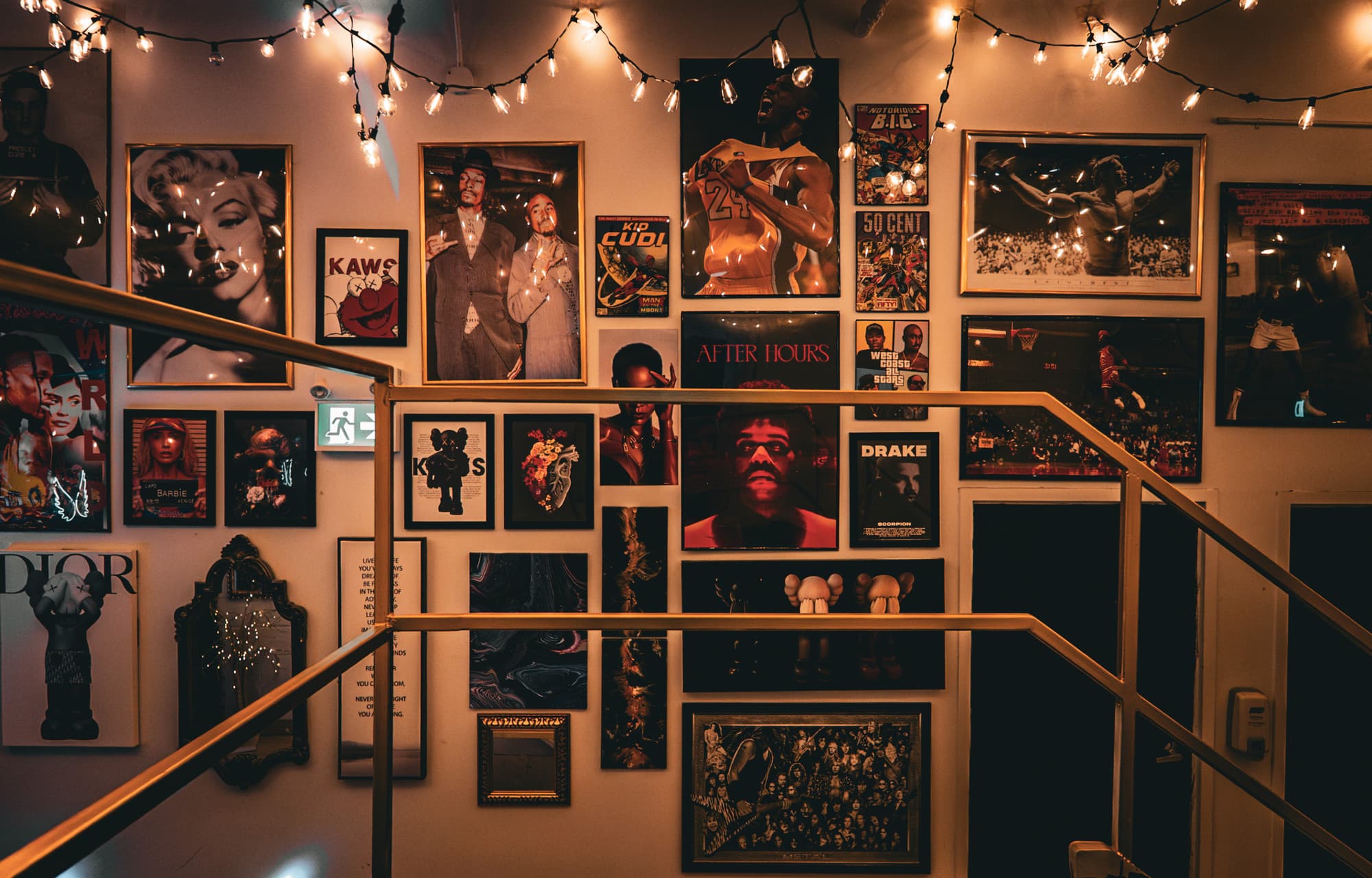 The 777 Lobby at Lush Lounge — gallery wall of legendary icons